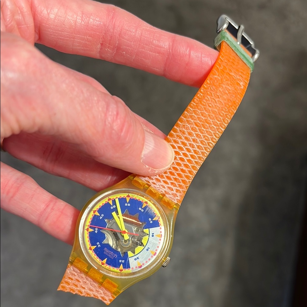Swatch Orange and Yellow Smartwatch with Vibrant Design